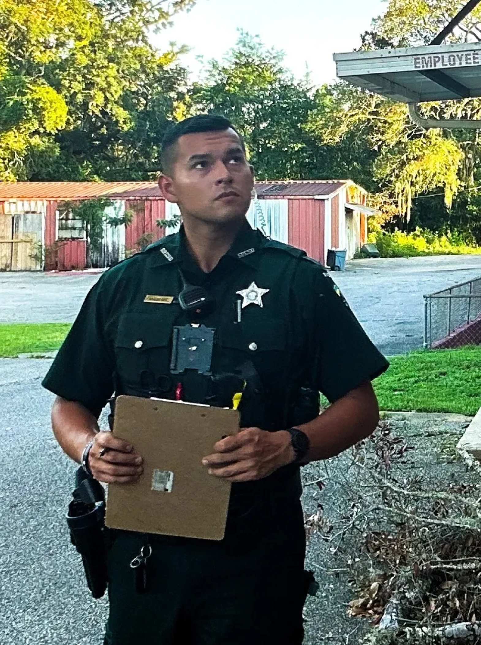 Officer in uniform with a clipboard