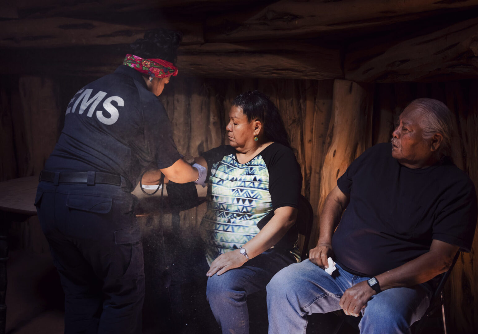Navajo Young Woman Paramedic Emergency Medical Technician (EMS) visiting patients at home