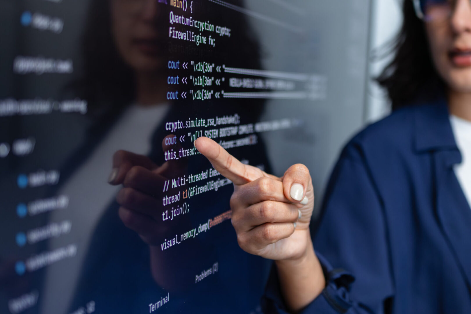 Woman Developer Leading Technical Discussion in Front of Code Display. Female IT Specialist Discussing Programming with Team.