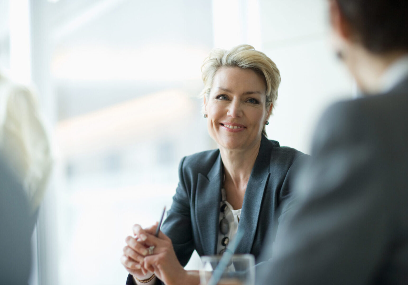 Smiling businesswoman in meeting